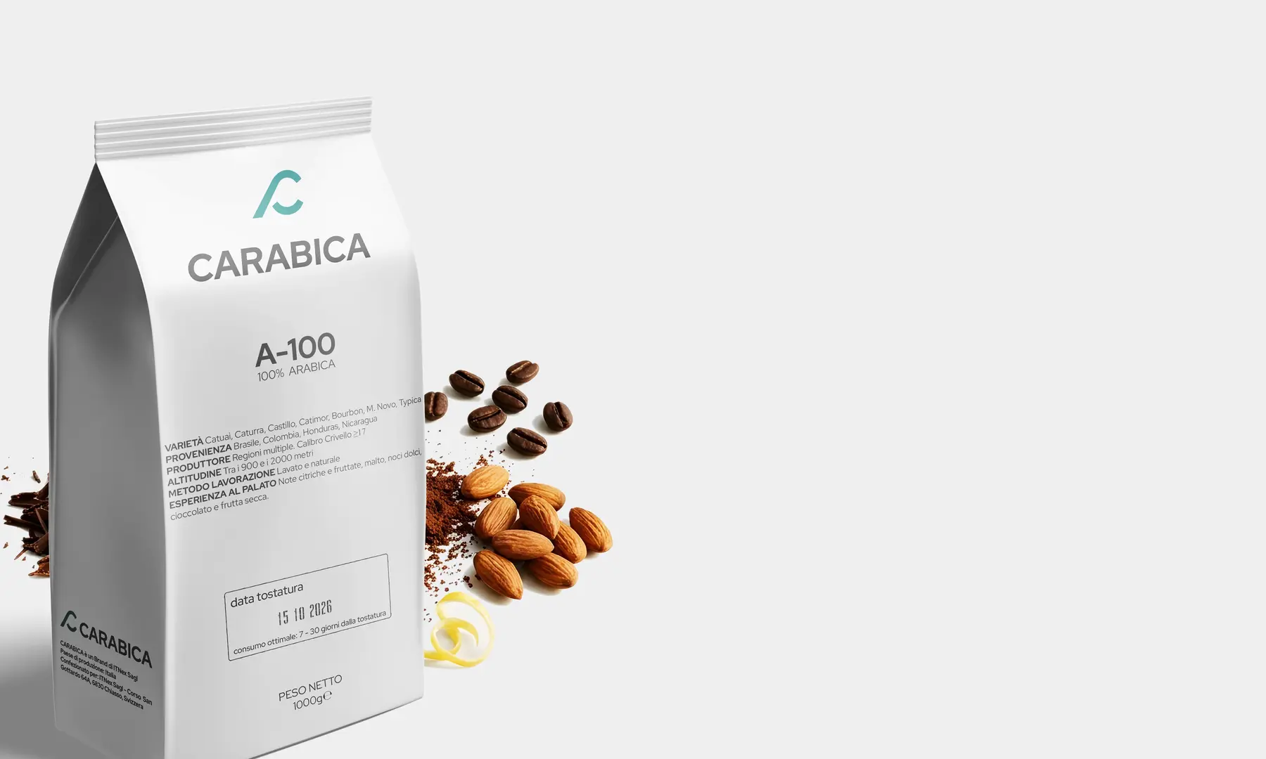 Confezione CARABICA A-100 con chicchi di caffè, mandorle, cioccolato e scorza di limone.